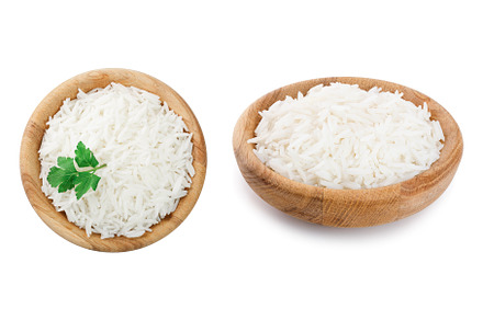 rice in a wooden bowl isolated on, a Food & Drink Photo by NataPhoto