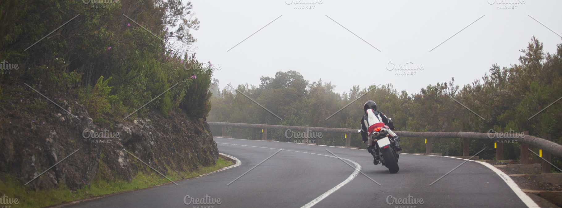 Motorcyclist riding on winding mountain road in fog, dynamic bik, a Photo by Pictures for you!!!!!!!!!