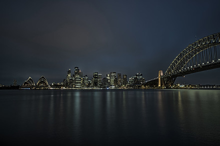 Sydney downtown with Harbour Bridge at night, an Architecture Photo by Nick Fox