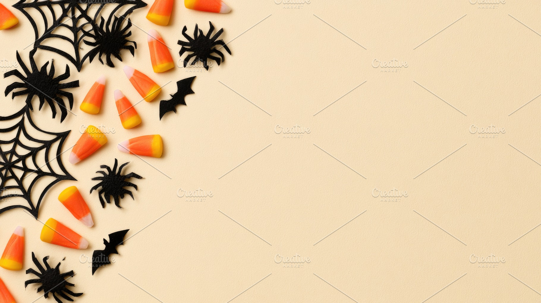 Halloween candy corn and spiders flat lay background, an Abstract Photo by José Manuel Gelpi