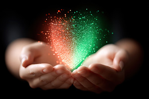 Glowing heart held in hands, an Abstract Photo by AlyaAnd