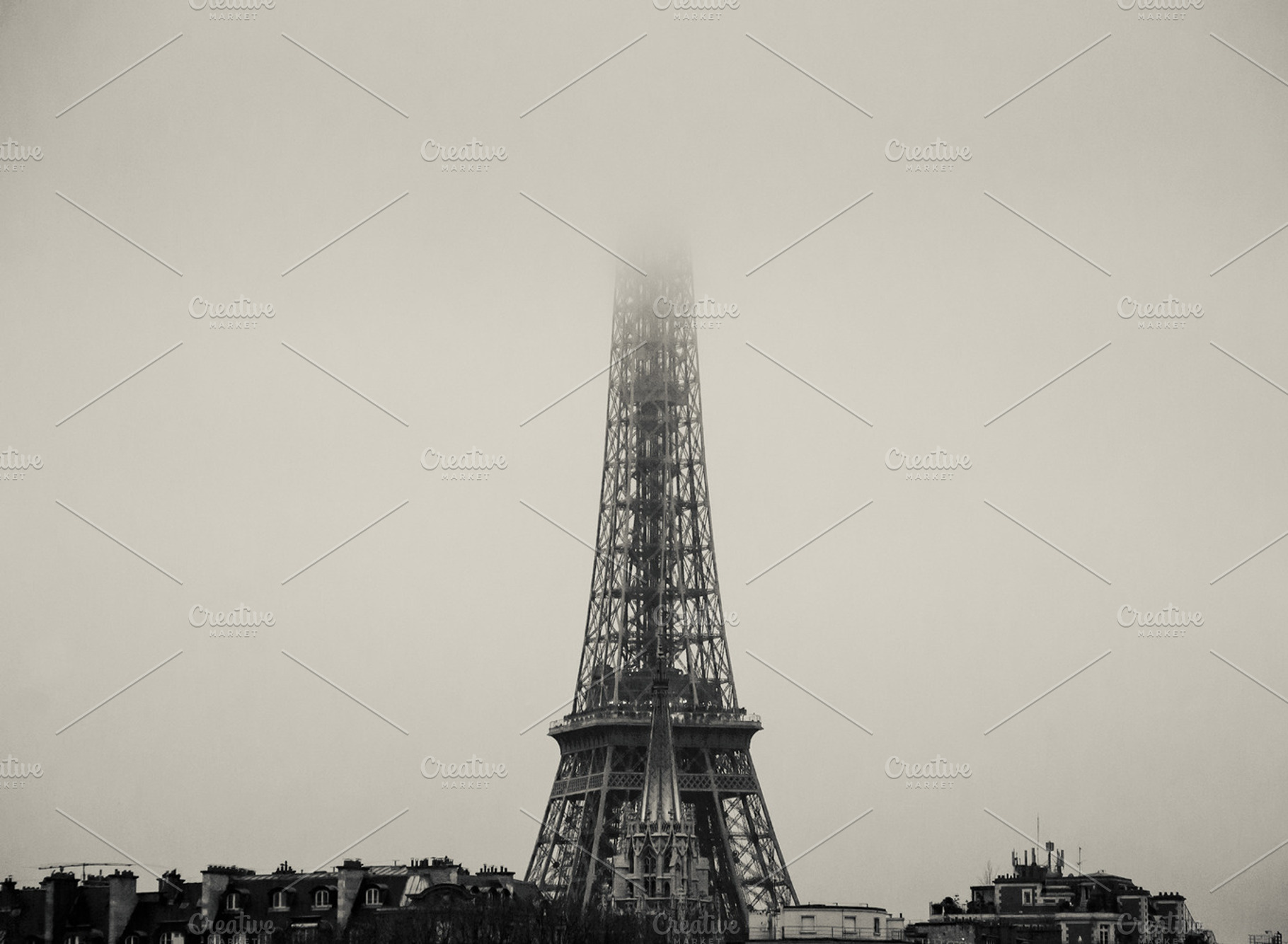 Eiffel Tower dissolving in fog, an Architecture Photo by Elena Dijour Photography