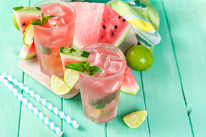 Watermelon lemonade with lime and containing watermelon, lemonade, and mojito