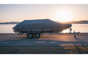Motorboat on trailer covered with, a Nature Photo by Igor Tichonow