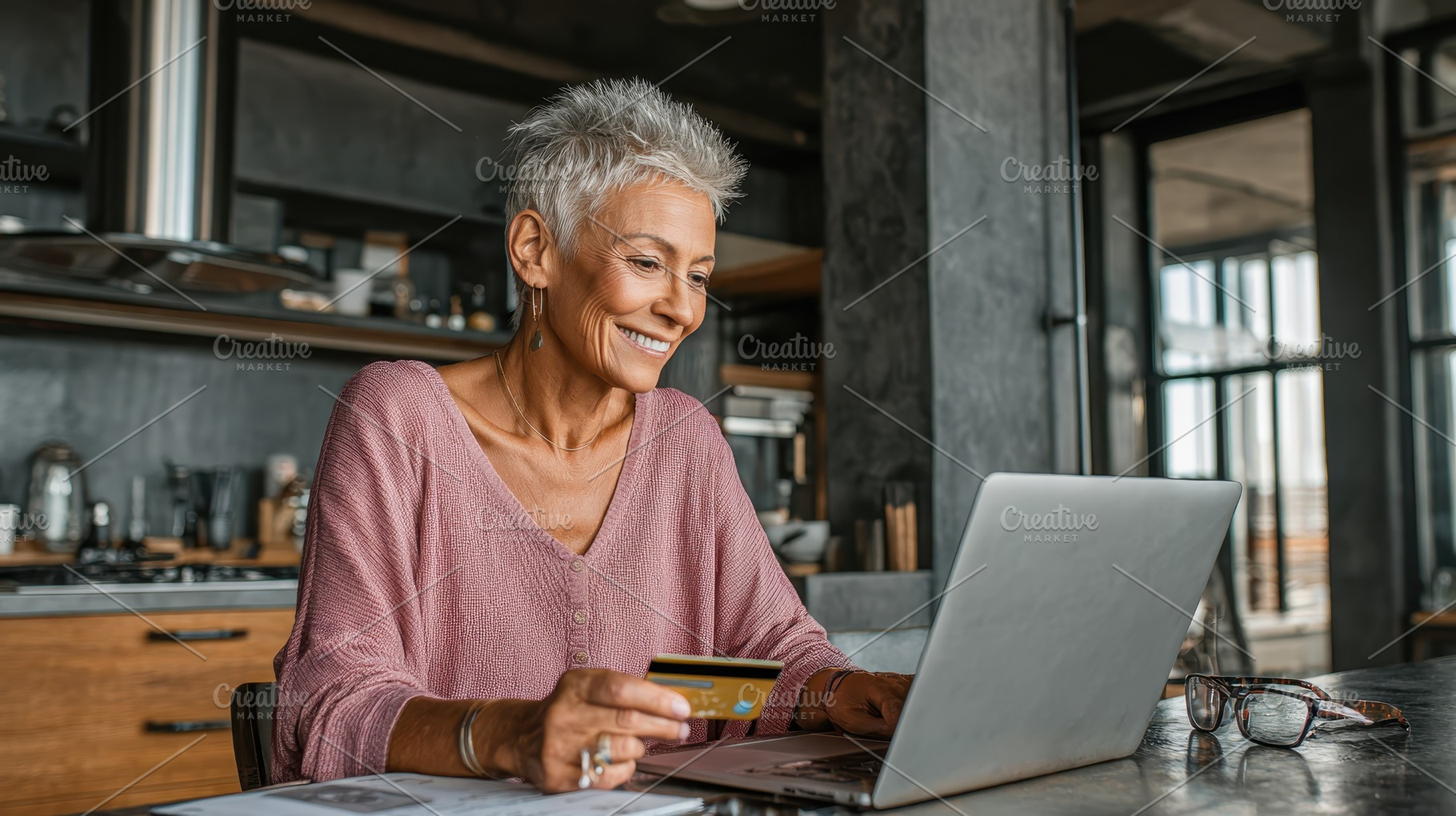 Senior woman online shopping credit, a Photo by Pixeness Studio