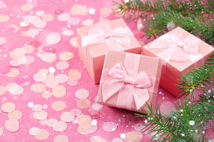 Christmas gifts with pink ribbon containing advent, background, and board, a Holiday Photo by Alim Yakubov