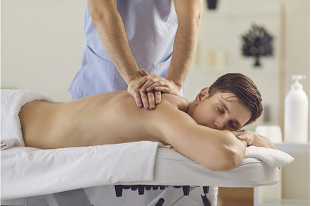 Young man with eyes closed enjoying, a Health & Medical Photo by StudioRomantic