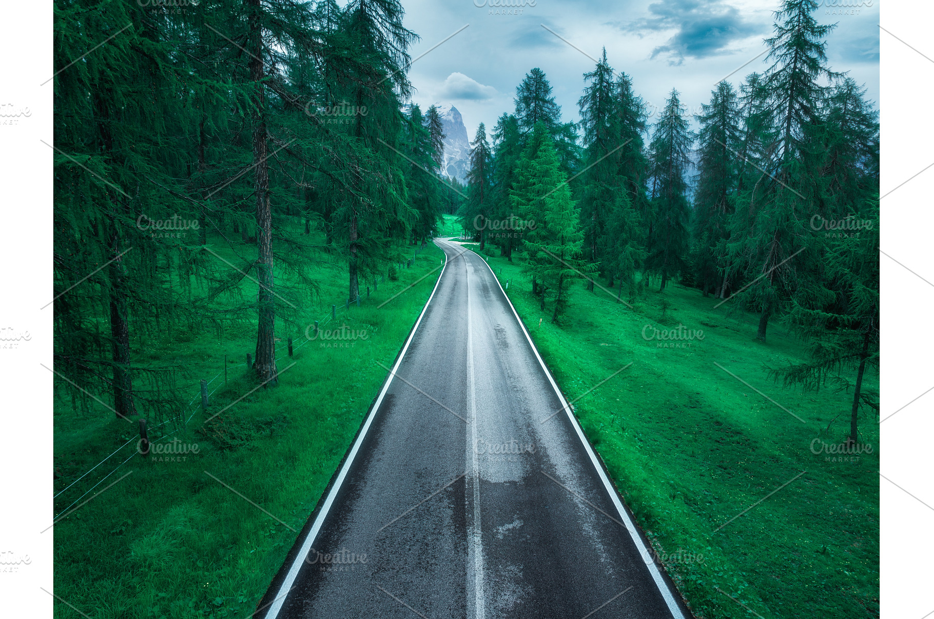 Aerial view of a winding asphalt, a Transportation Photo by den-belitsky