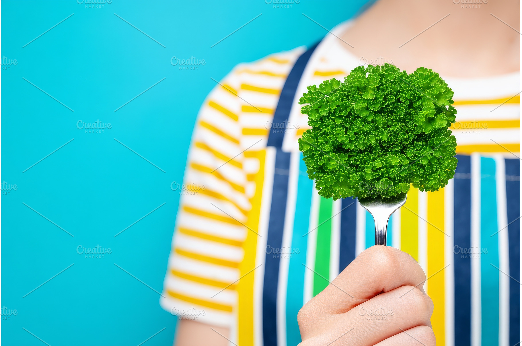 A woman is shown holding a fork with, a Food & Drink Photo by ZinetroN