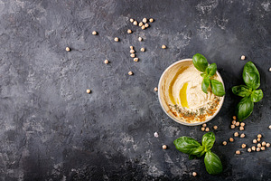 Hummus with olive oil and ground cumin
