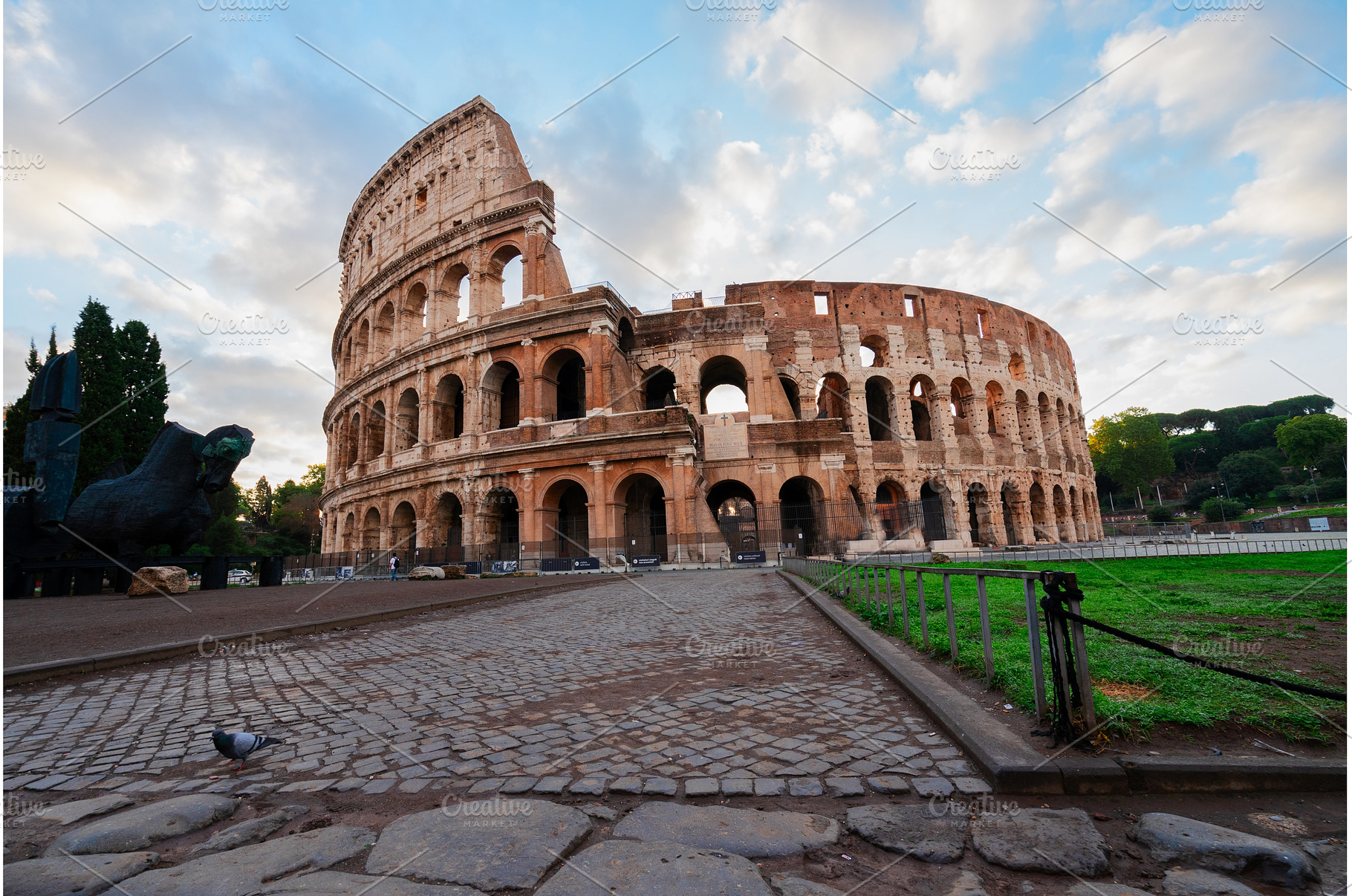 Colosseum at sunset in Rome, Italy, an Architecture Photo by Neirfy