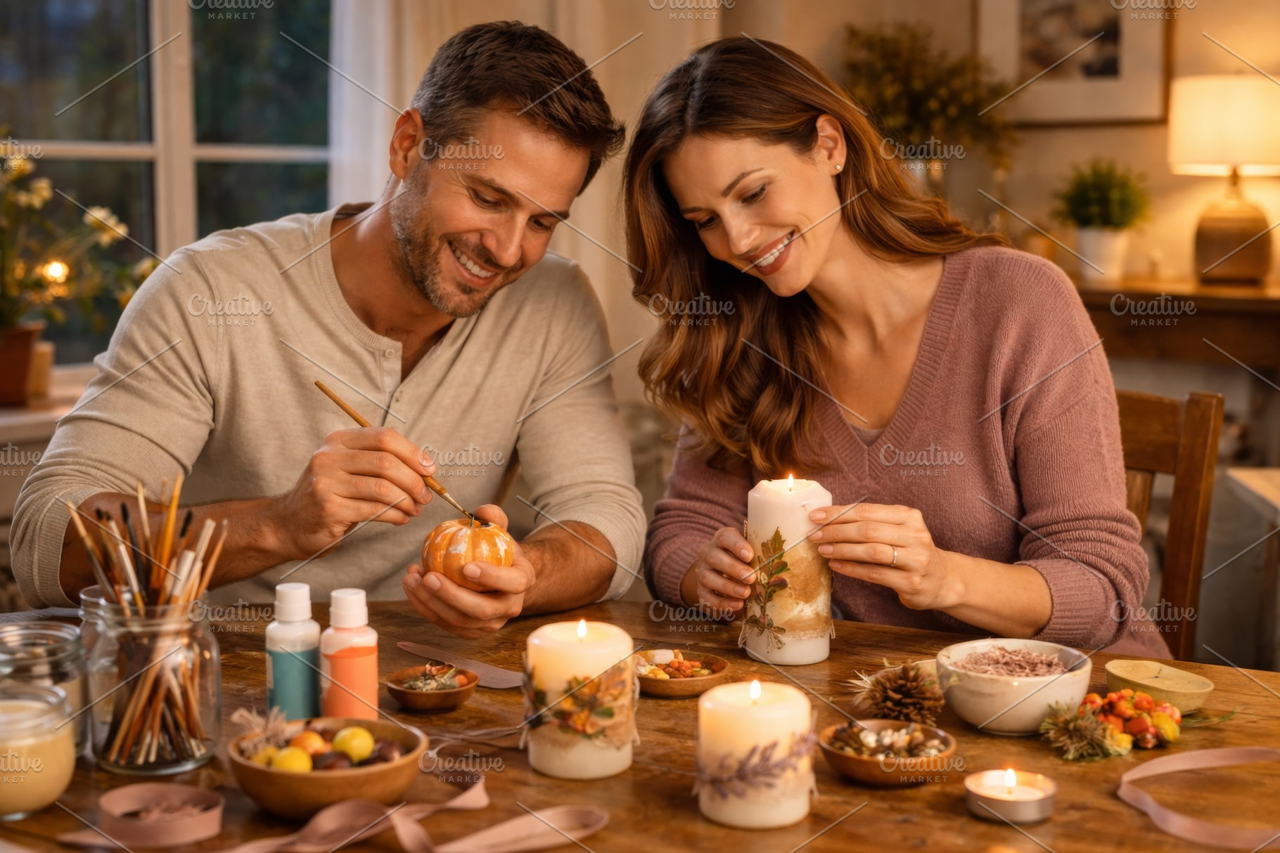 Couple engaged in autumn craft activ, a Photo by Dvoevnore photos