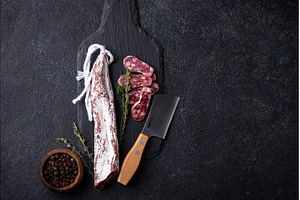 Salami sausage fuet with spice, a Food & Drink Photo by Yulia Furman