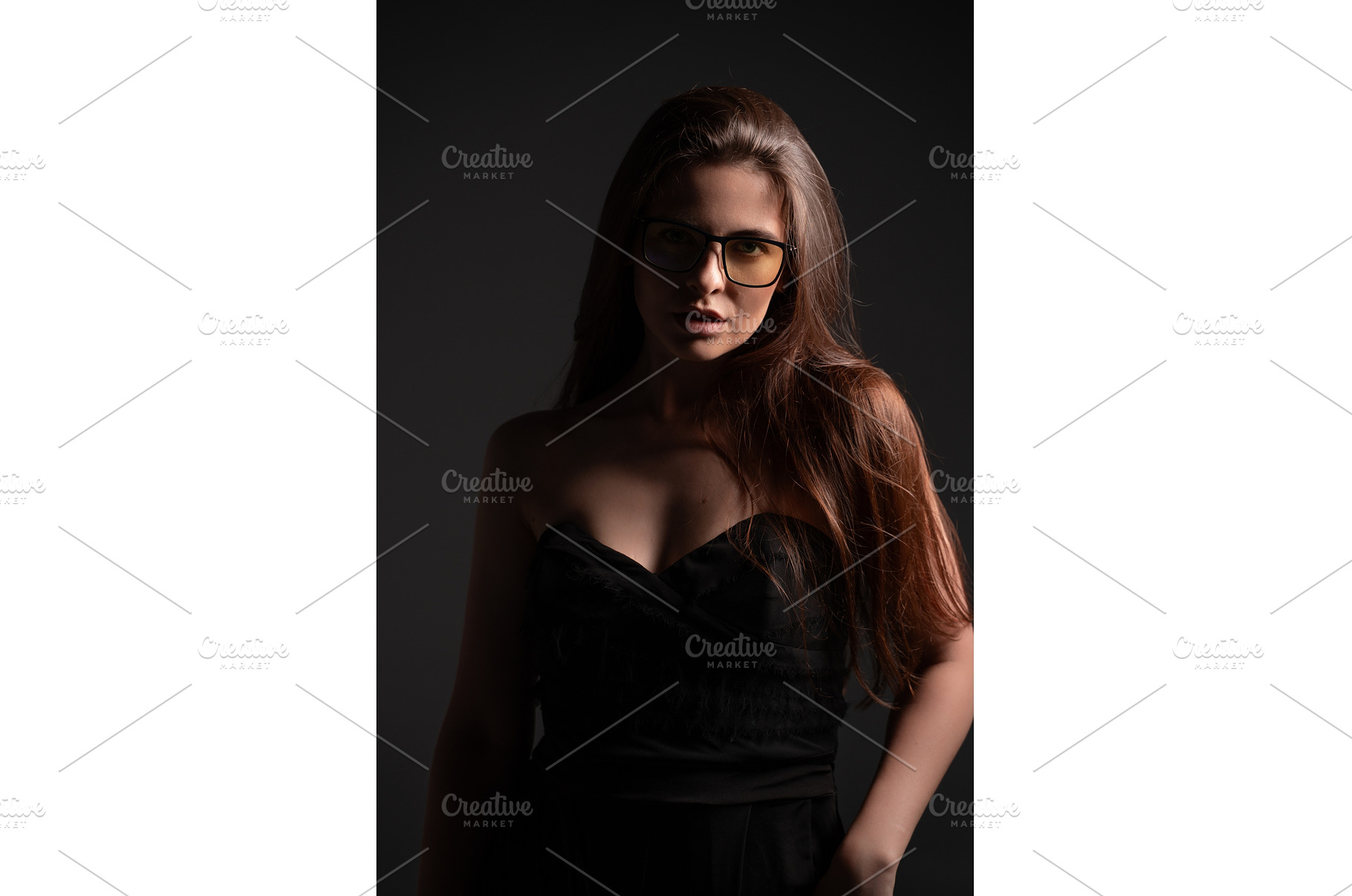 Woman wearing reading glasses with, a Person Photo by volodymyrshtun13795