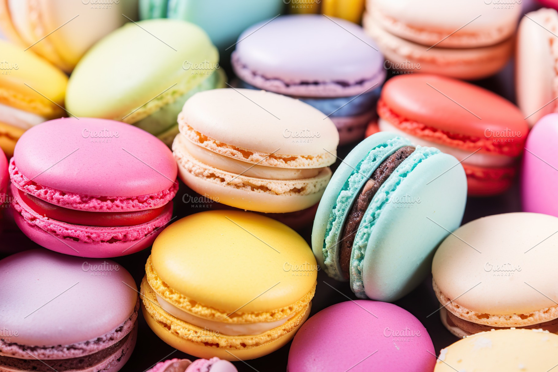 Colorful macarons dessert background, a Food & Drink Photo by AlyaAnd