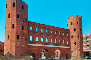 a frontal view of the Porta Palatina in Turin, a Photo by Nito