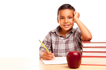 Young Hispanic School Boy At Desk, a Photo by Andy Dean Photography