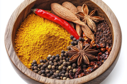 Curry Powder and garam Masala in a W, a Background Photo by Pixeness