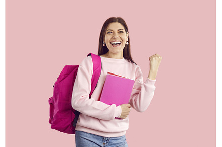 Happy excited female student with, a School & Education Photo by StudioRomantic