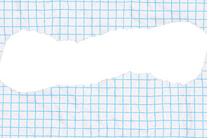 Piece of paper with a light blue grid pattern and a large, torn, a Background Photo by ndanko