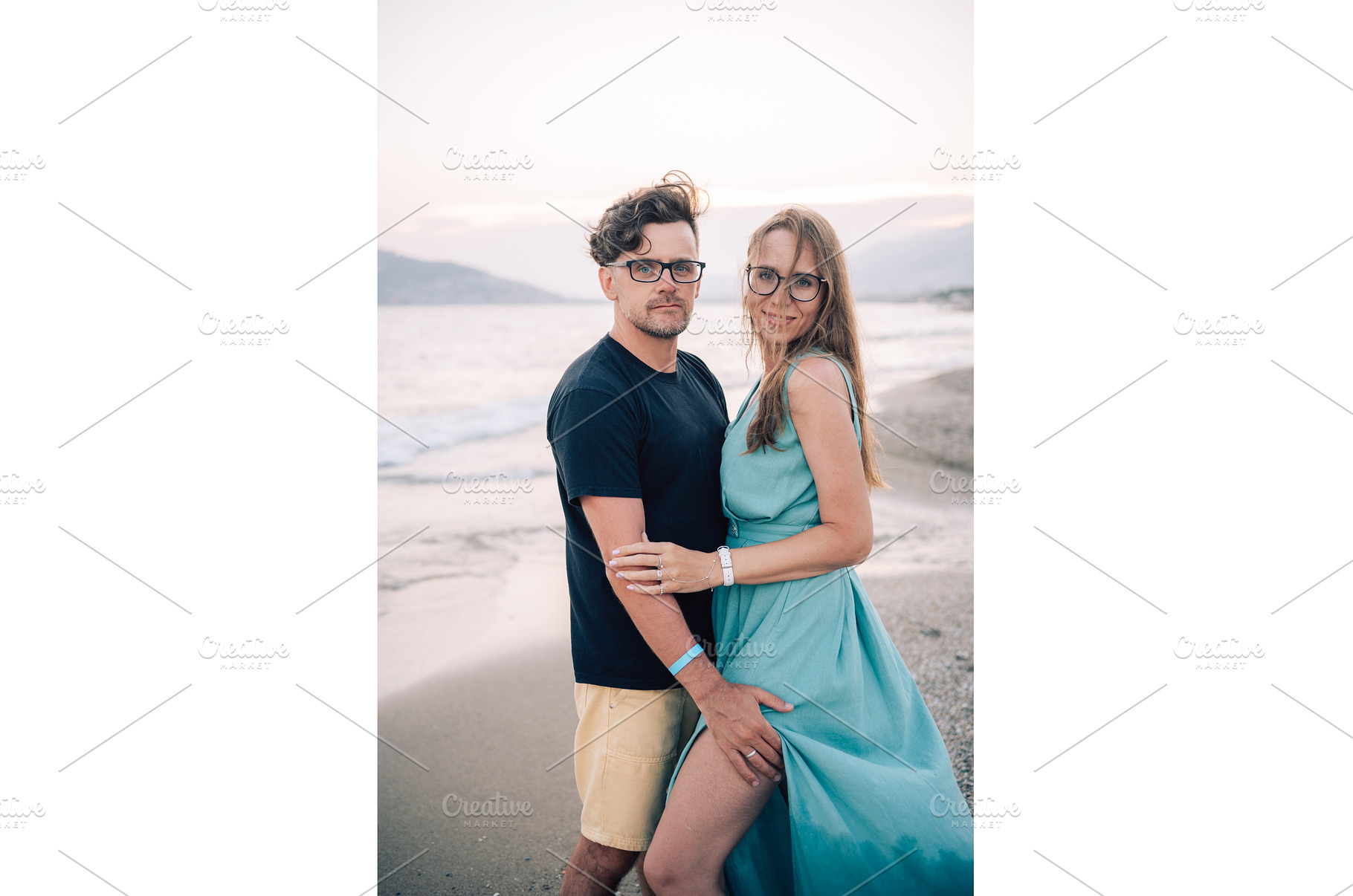 Happy Couple Embracing on a Sandy, a Person Photo by Jan Jack Russo Media