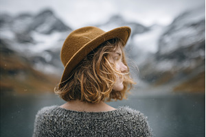 A woman is standing at the lakeside, a Person Photo by ZinetroN