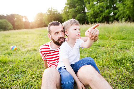 Hipster father and little son on green meadow sunny summer day containing, a Person Photo by HalfPoint