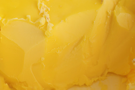 Butter plastic container isolated on white background. Dairy pro, a Background Photo by Tampatra