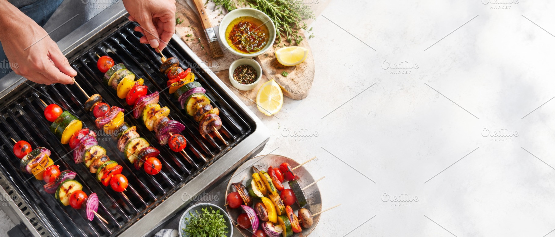 Summer BBQ skewers on grill with fre, a Photo by Dvoevnore photos