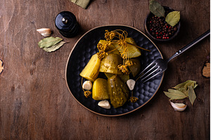 Bowl of pickled marinated cucumbers, a Food & Drink Photo by Yulia Furman