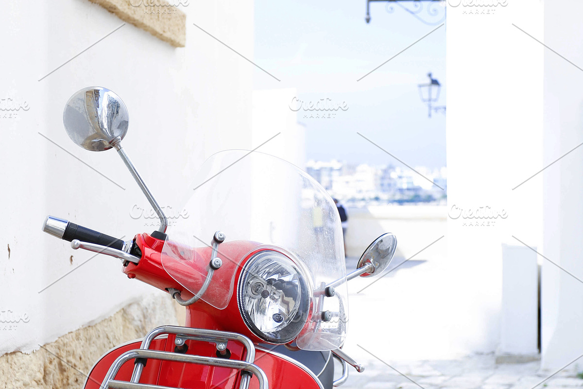 Red vintage scooter in the street, a Photo by tetihalva (Photo 1 of 2)