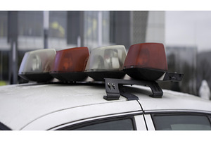 Flashing police car emergency lights, a Transportation Photo by Media Whale Stock