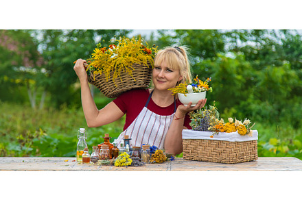 Woman with medicinal herbs and, a Nature Photo by yanadjana