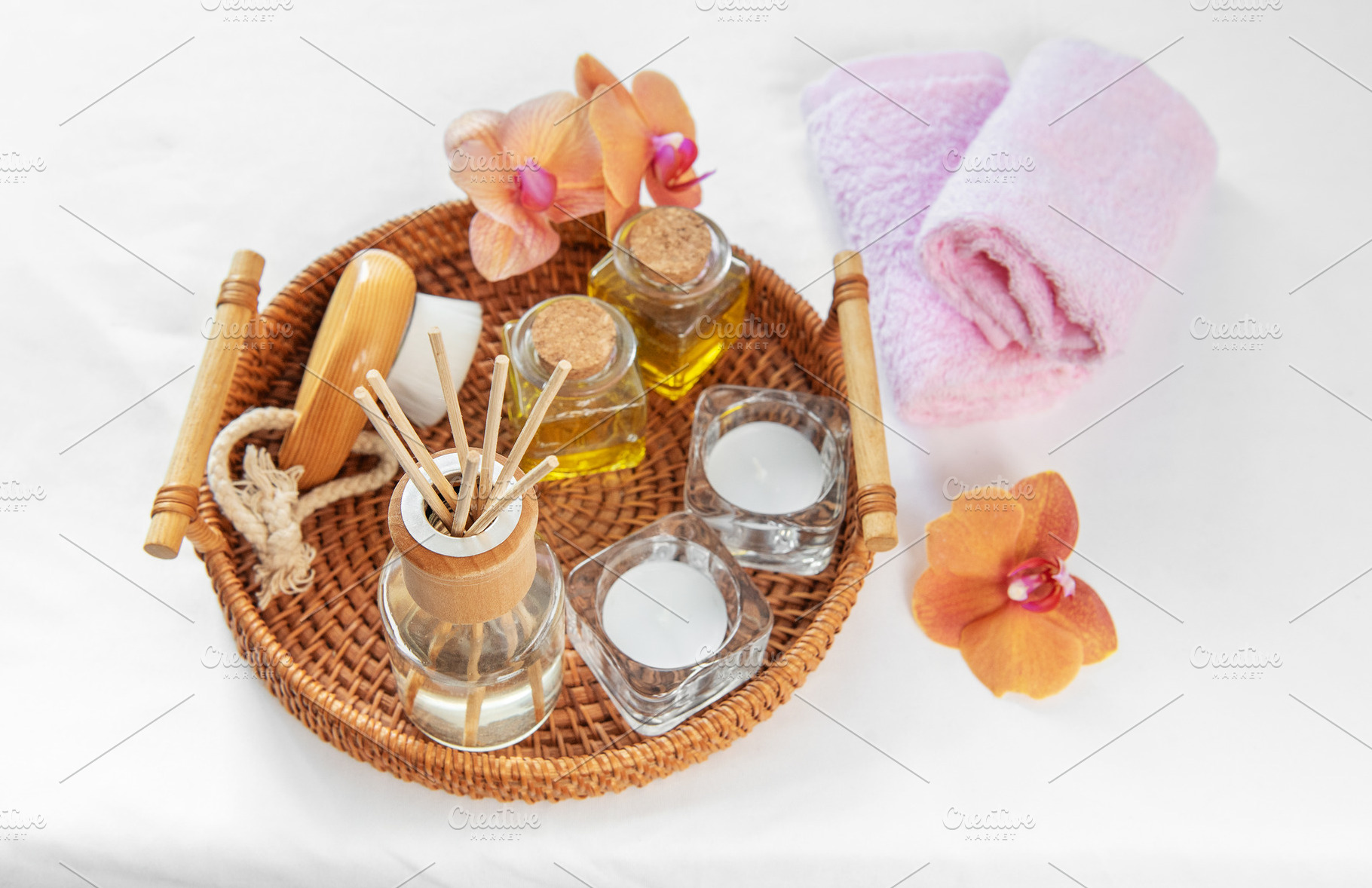 Spa wellness items with fragrant oil and orchid on white, a Beauty & Fashion Photo by Olena Rudo