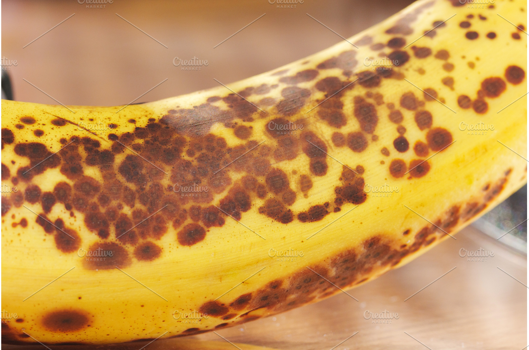 A ripe banana showcases its yellow, a Food & Drink Photo by darksoul72