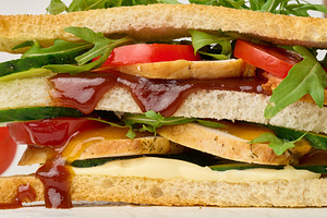 Multilayer sandwich with chicken, fresh cucumber, tomato and aru, a Food & Drink Photo by ndanko
