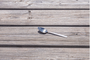 One metal spoon is on the gray, a Food & Drink Photo by Illustrations&photos