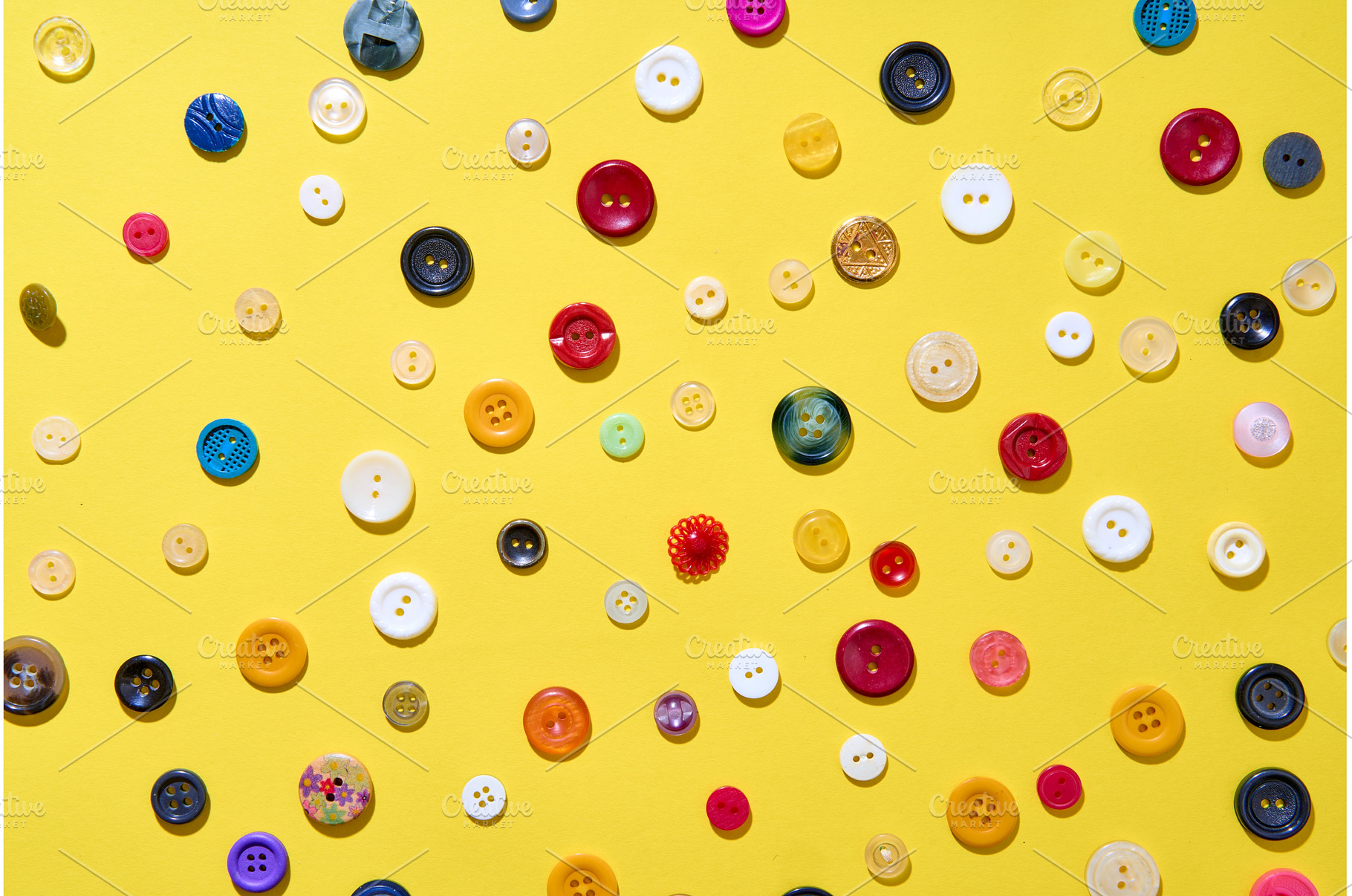 Colorful sewing buttons on bright, a Background Photo by Gladkov photography