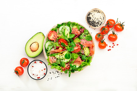 Spring salad with salted salmon, avocado, tomatoes, cucumber, bl, a Food & Drink Photo by 5PH