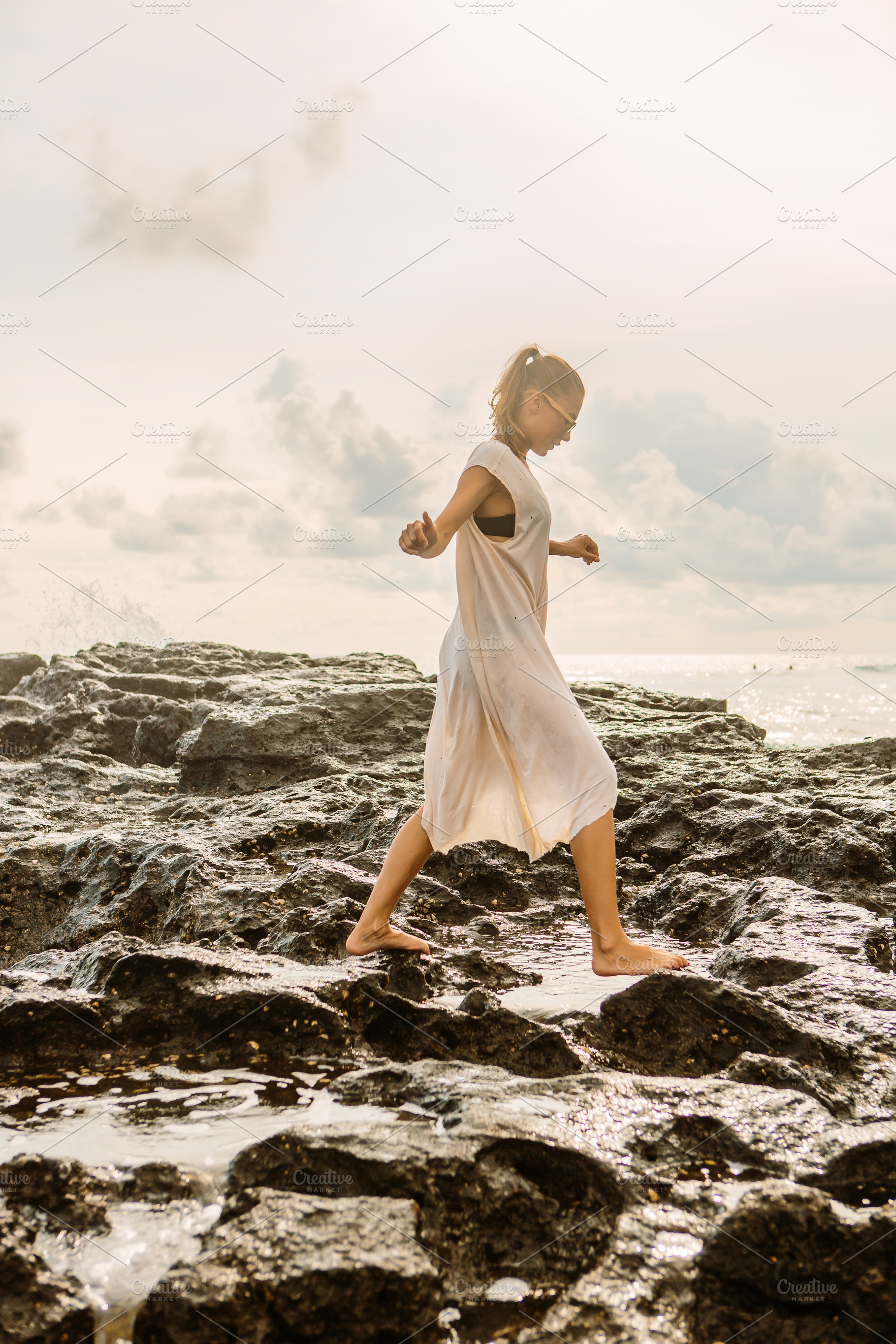 Pretty woman near danger rocks on oc featuring woman, sea, and girl, a Beauty & Fashion Photo by Mikalai