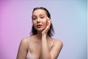 Young woman applying white, a Person Photo by volodymyrshtun13795