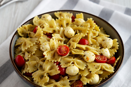 Homemade Pesto Pasta with Tomatoes ans Mozzarella in a Bowl, sid, a Food & Drink Photo by LiudmylaChuhunova