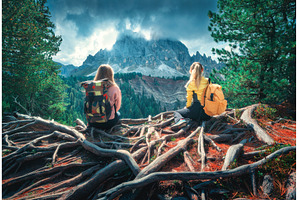 Two young women with backpacks, a Nature Photo by den-belitsky