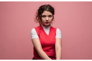 Young woman with curly hair, a Person Photo by volodymyrshtun13795