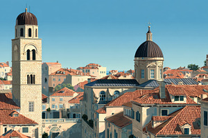 Historic buildings in a coastal town, a Photo by Beautiful things