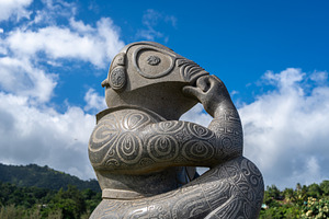 Stone tiki statue in Atuona Bay, Hiva Oa, Marquesas Islands, an Arts & Entertainment Photo by GoodGoods