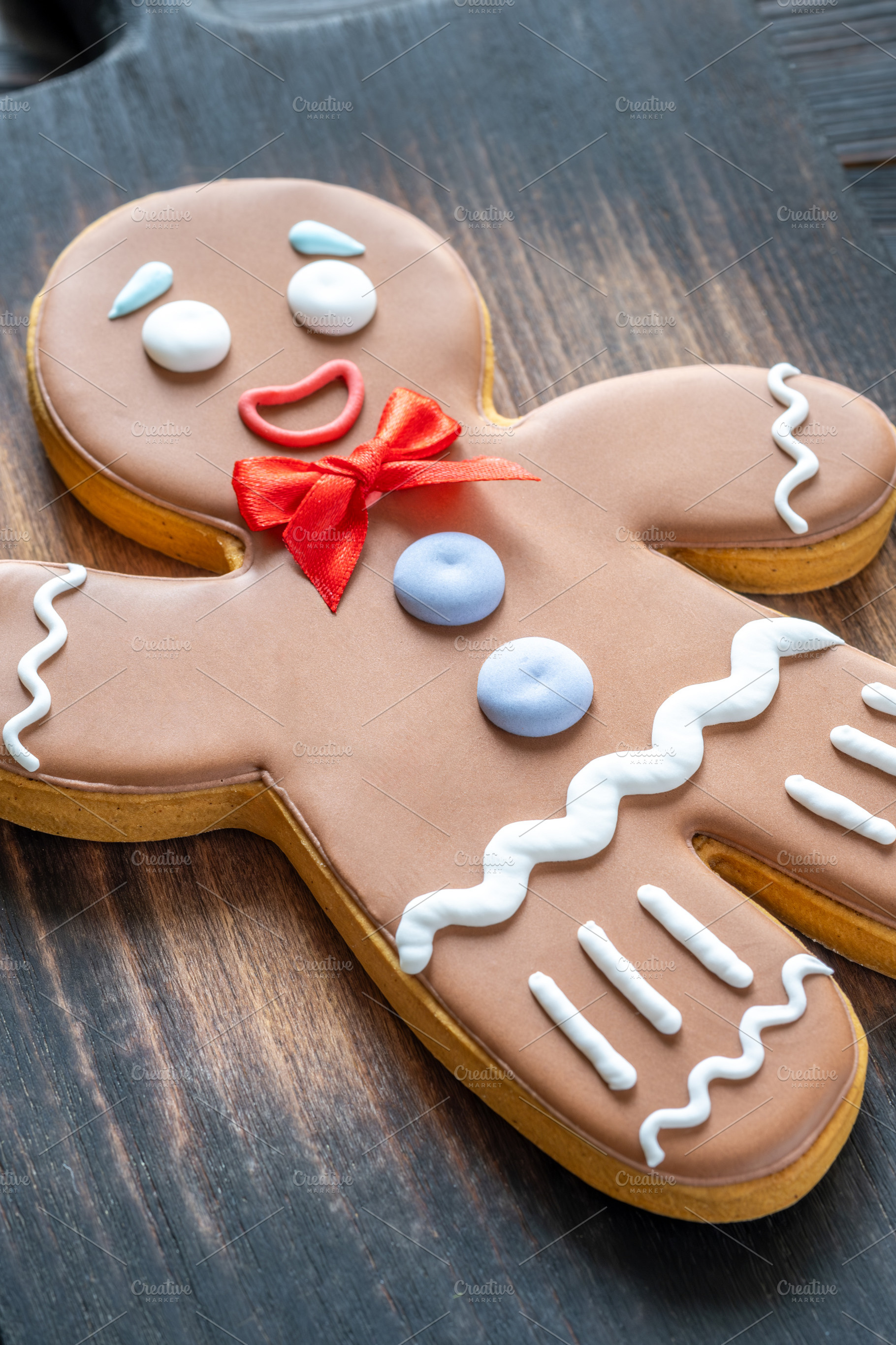 Big Gingerbread Man with Red Bow, a Food & Drink Photo by Alexander Prokopenko
