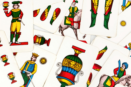 Traditional italian playing cards showing knights and cups, a Food & Drink Photo by Antonio Gravante Market