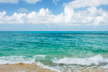 Blue sea water cloudy sky sand beach, a Nature Photo by LiliGraphie