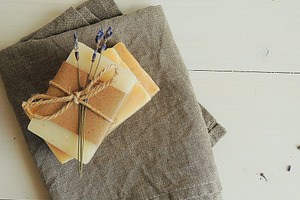 Handmade natural soap containing conceptual, sale, and ribbon